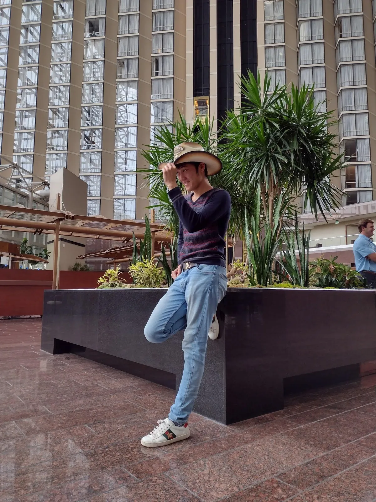 Alaric Ong wearing a cowboy hat