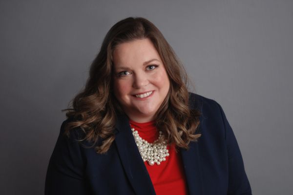 Portrait of Cheyanne Culbert against a gray background.