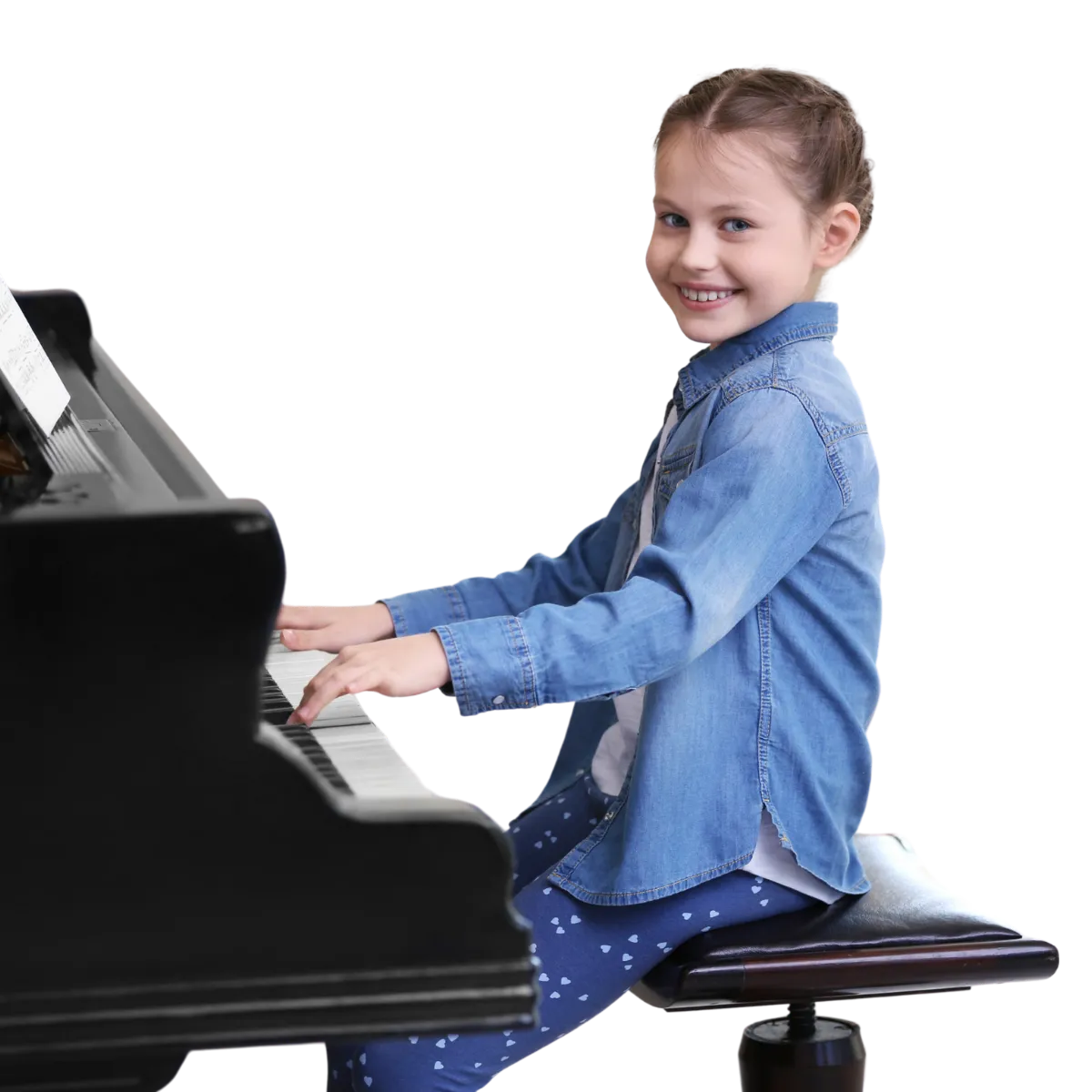 Kid smiling while Playing piano