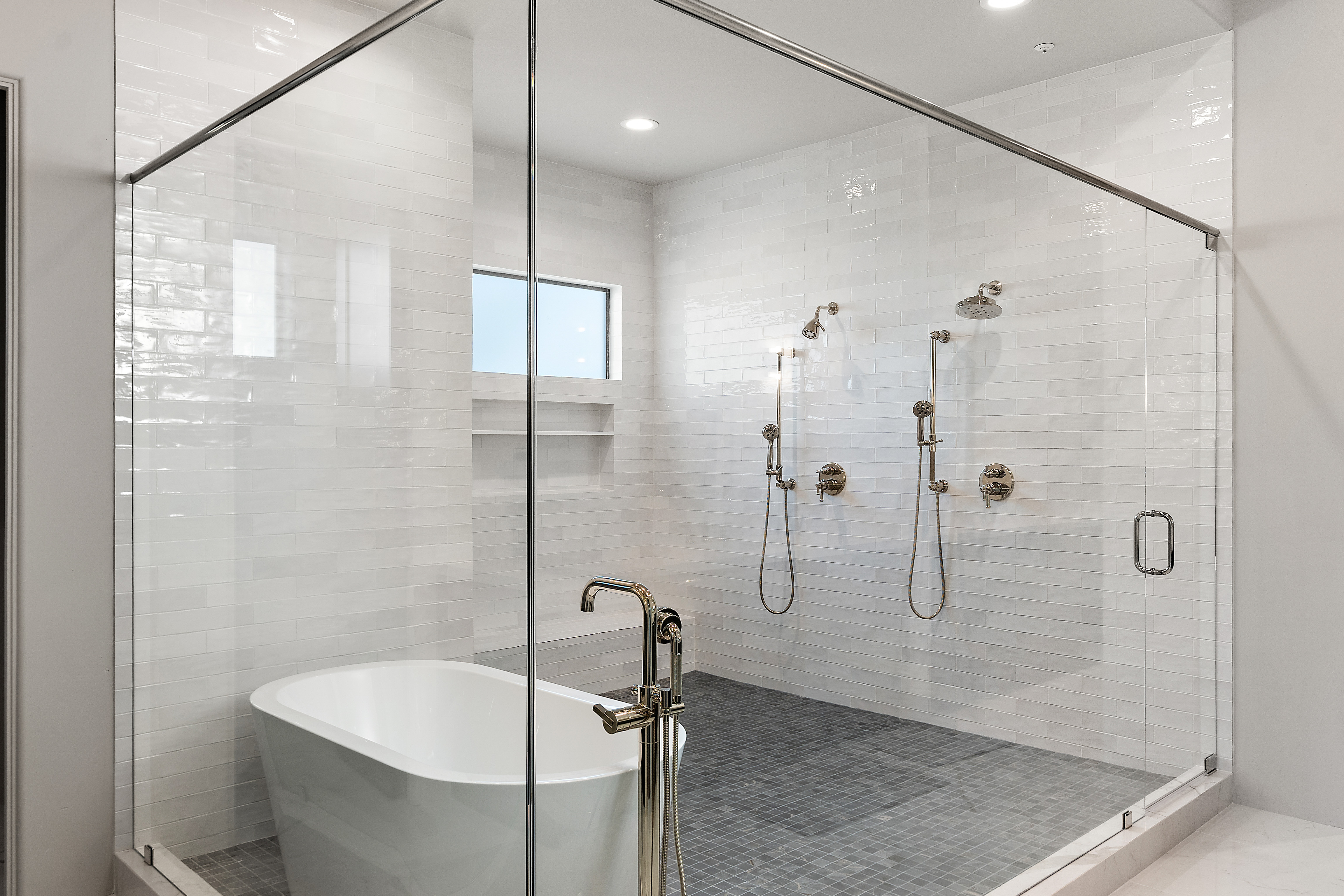 Spa-style bathroom renovation with frameless glass shower and soaking tub — N&M Home Services, Paradise Valley and Scottsdale AZ