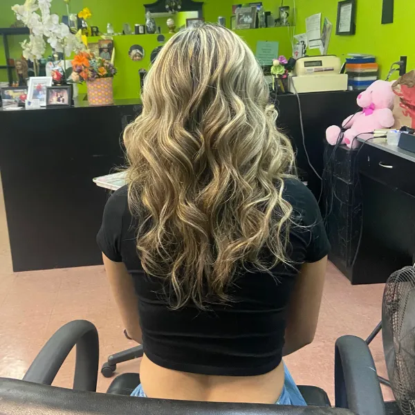 curls and bayalage on a woman