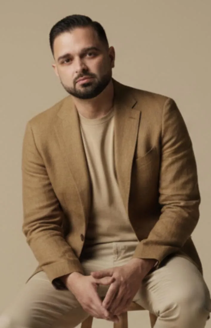 man wearing watch with black suit