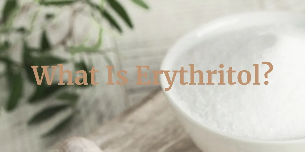 White crystalline erythritol powder in a white bowl