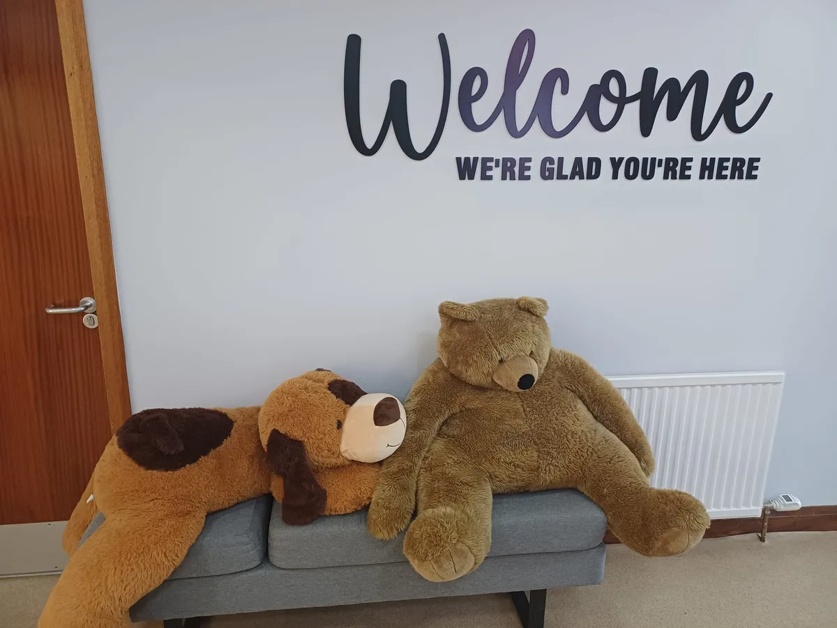 Welcome sign and soft toys at Mainly Play