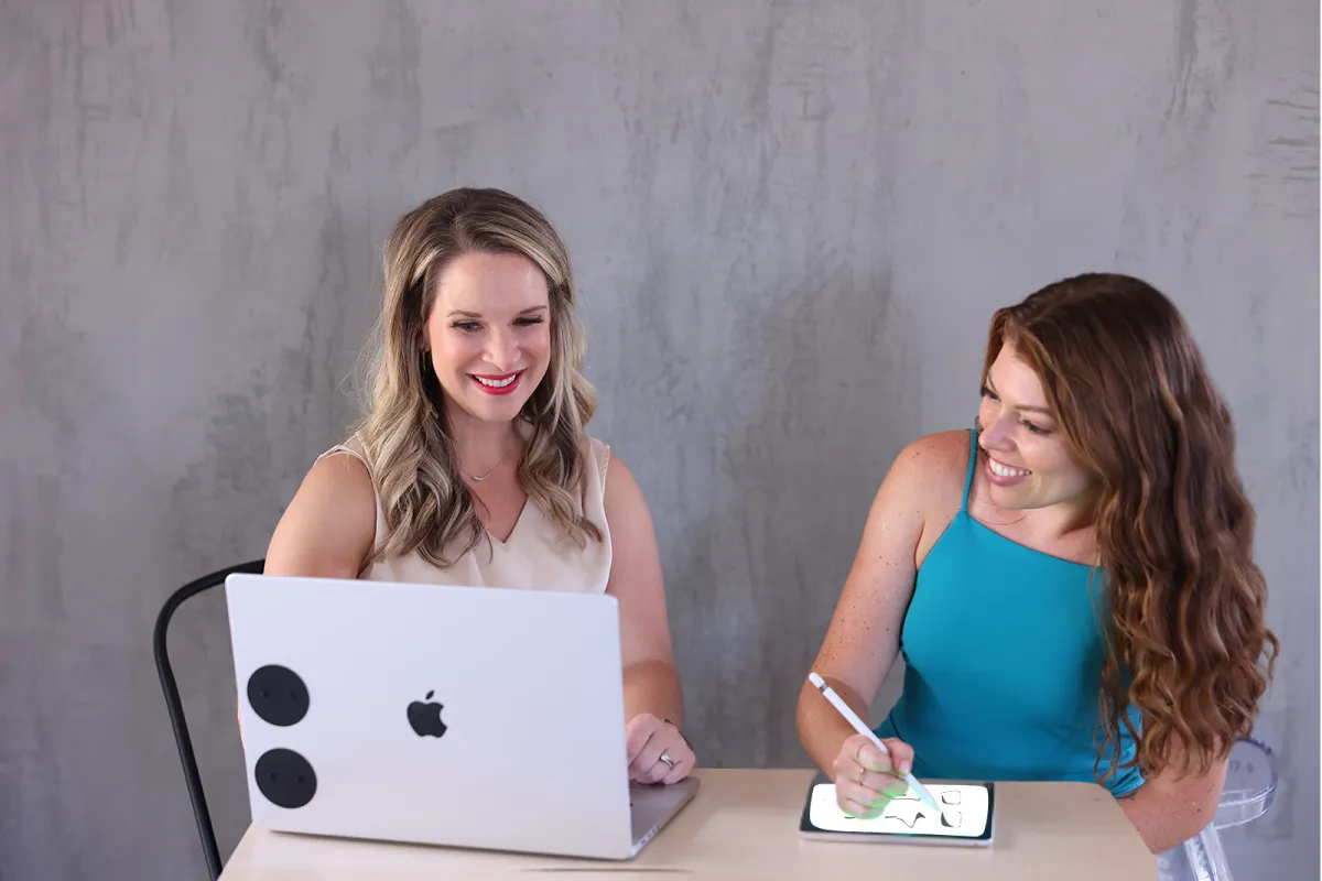 Two woman working together at Maison Charlottesville