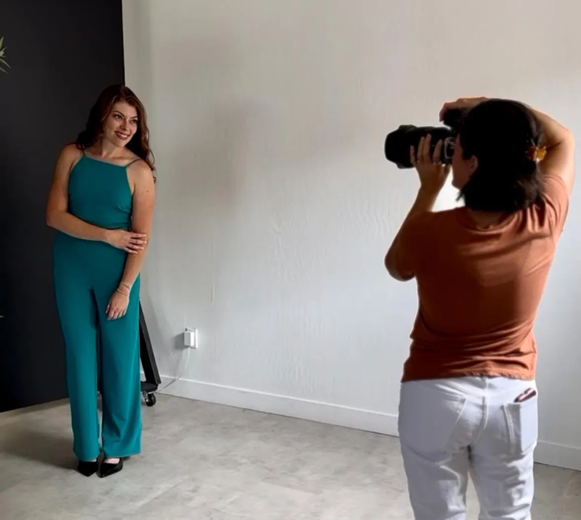 Brittany Hall getting photographed during a brand photoshoot