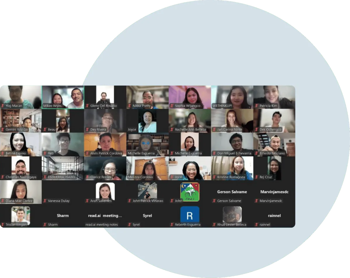 A large-scale Zoom or Google Meet video conference grid showing dozens of diverse team members collaborating remotely.