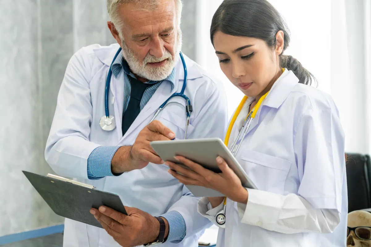 Doctors reviewing medical records
