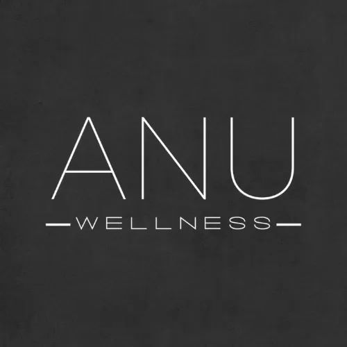 Portrait of Dr. Michael Reyes, board-certified clinician, studio gray background