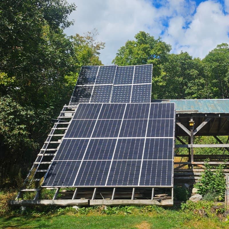 arge off-grid solar panel array in Quebec powering a 6,000 sq ft off-grid home