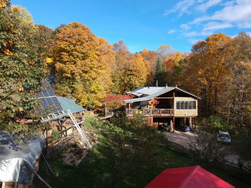 Fall view of The Off Grid Ark wedding venue surrounded by forest in Western Quebec, near Ottawa–Gatineau.