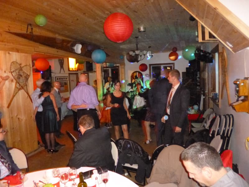 Guests dancing during an indoor wedding reception at The Off Grid Ark, using a DJ or DIY music setup near Ottawa–Gatineau.