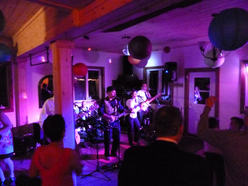 Live band performing during an indoor wedding reception at The Off Grid Ark near Ottawa–Gatineau.