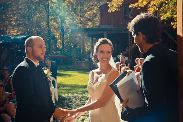 Mike Caldwell officiating an outdoor wedding ceremony at The Ark in Western Quebec.