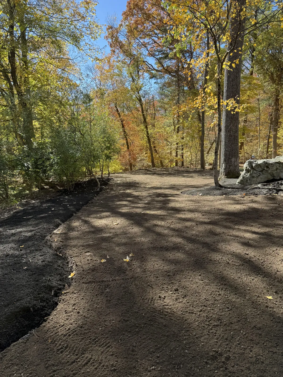 Gravel driveway site preparation and landscape grading by A. Fowkes Landscape & Construction