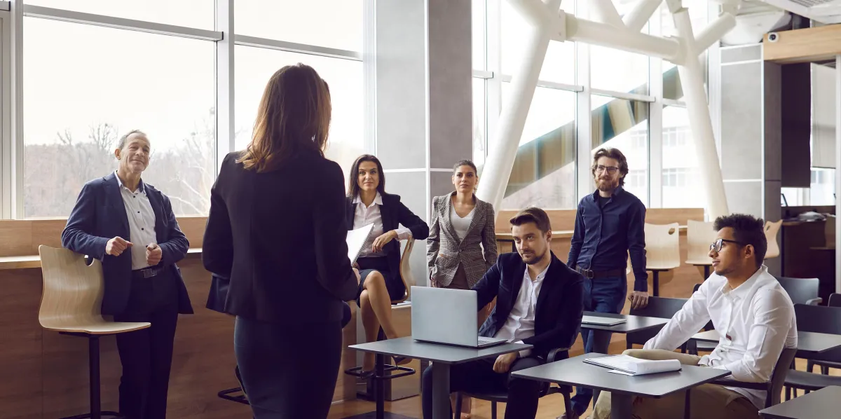 Image of a team in a board room discussing Organizational Development