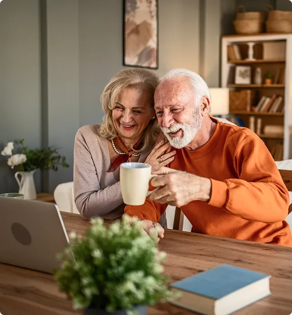 Happy couple attending a meeting on the iPad
