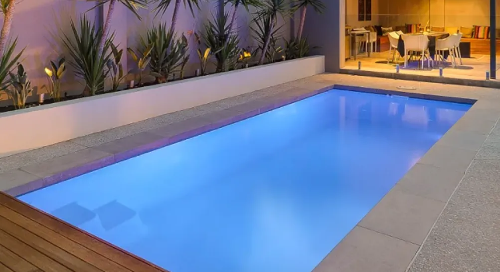 Crystal-clear blue pool water by Poseidon Pools CQ