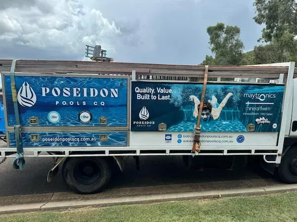 Crystal-clear blue pool water by Poseidon Pools CQ
