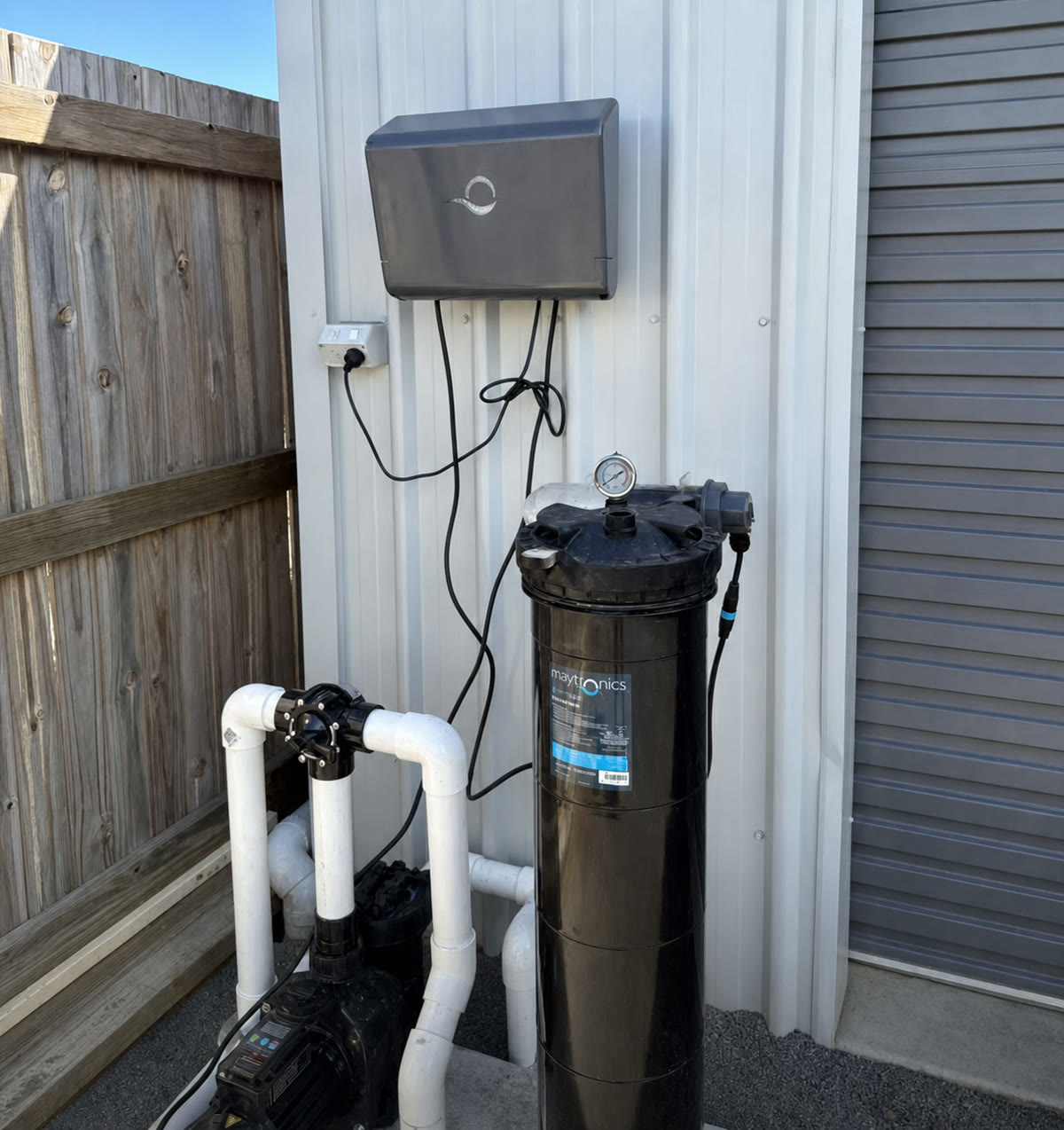 Installed Maytronics pool filtration system by Poseidon Pools CQ