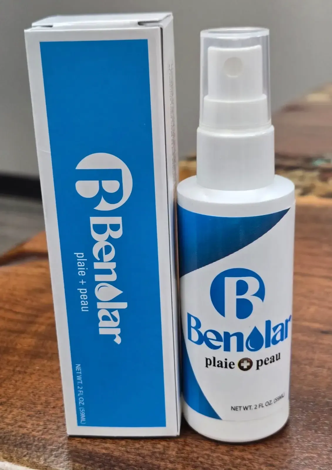 Bottle of Benolar next to its packaging