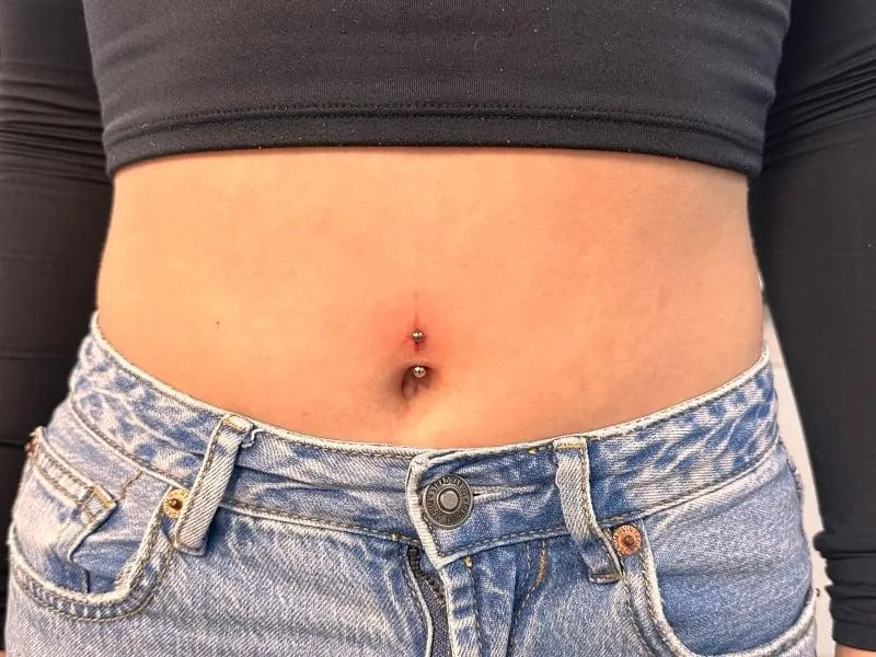 navel piercing Deventer Iris Tattoo Art