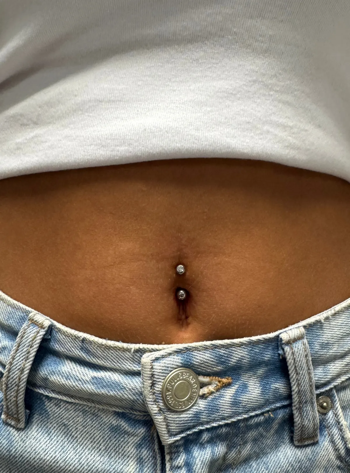 navel piercing Deventer Iris Tattoo Art
