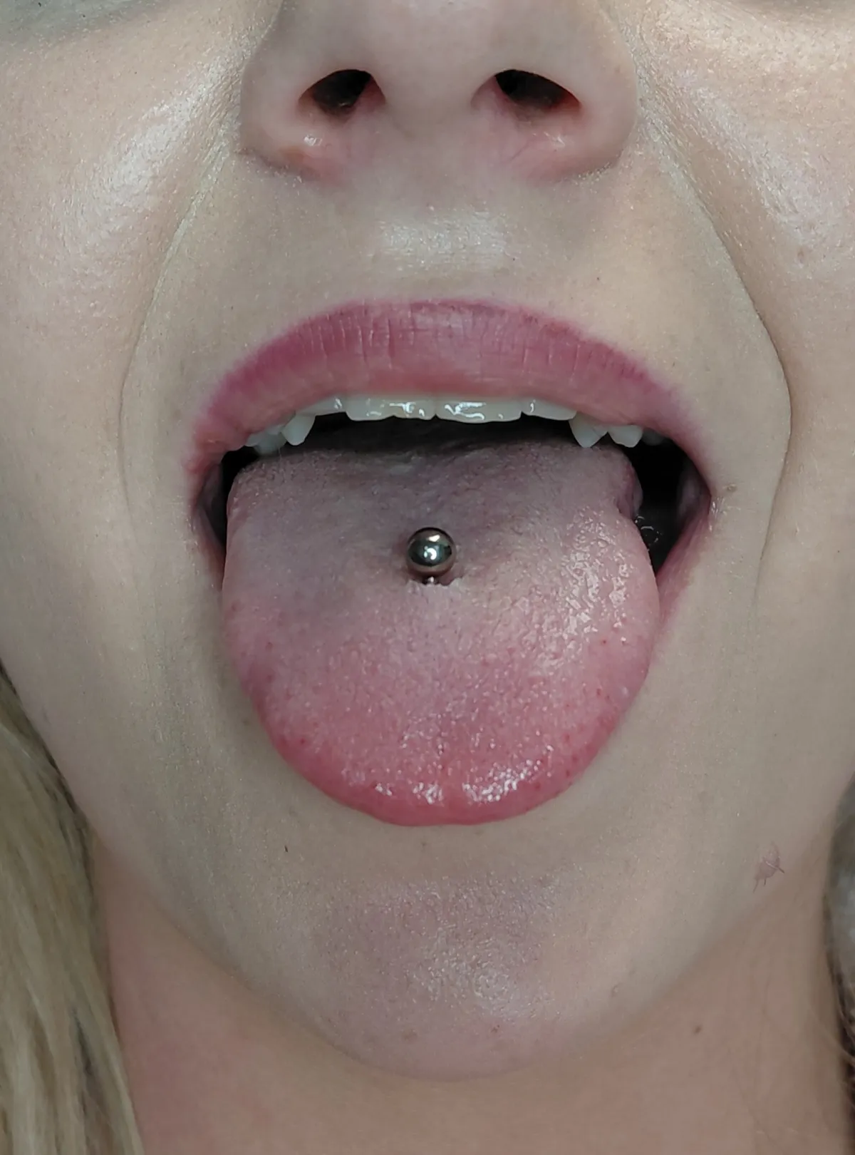 tong piercing Deventer Iris Tattoo Art