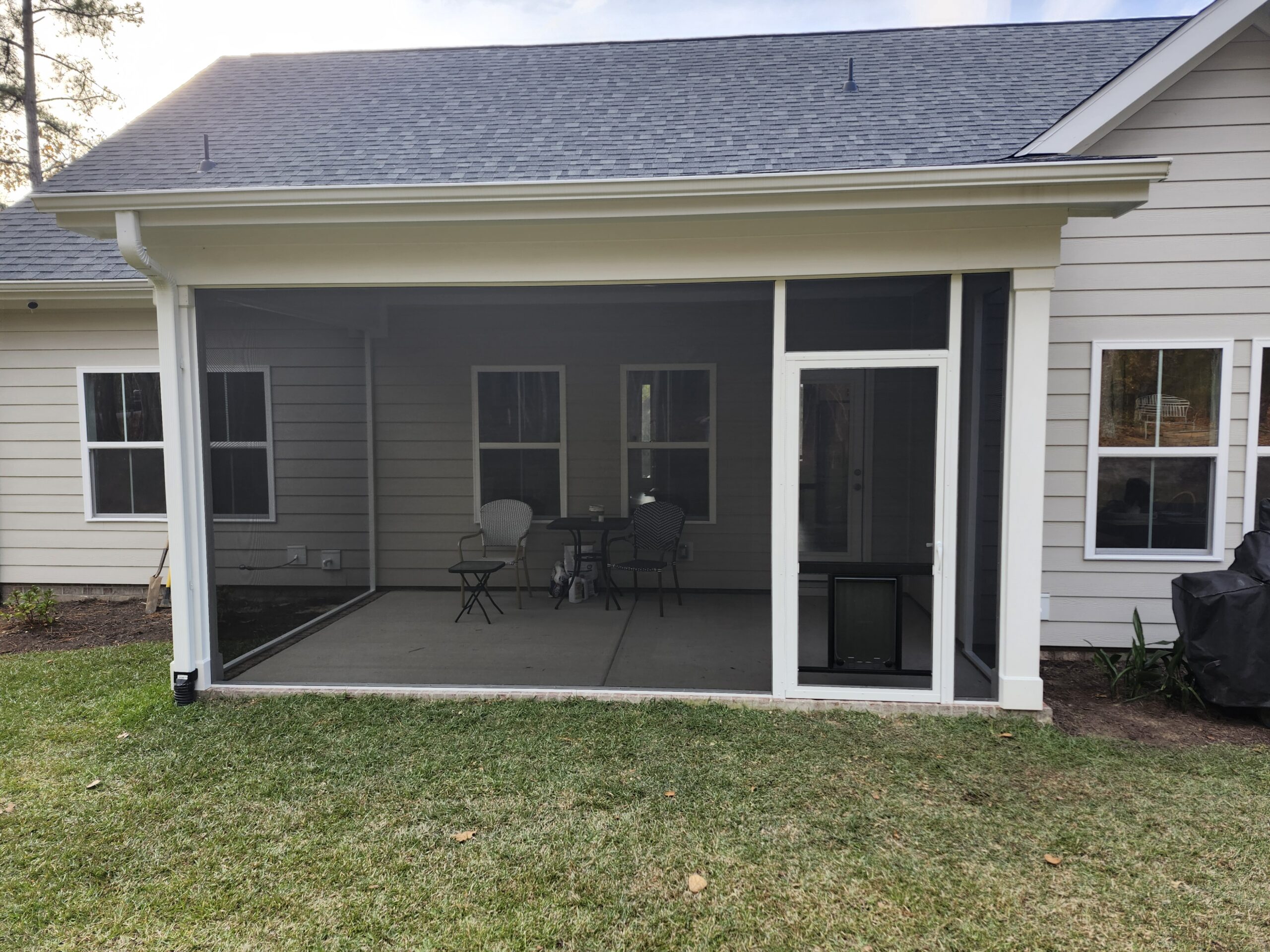 Project Gallery — Specified, Installed, Documented. Professionally certified screened porch enclosure installation on a residential home, written into construction documents and documented with technical data showcasing a completed screen room addition