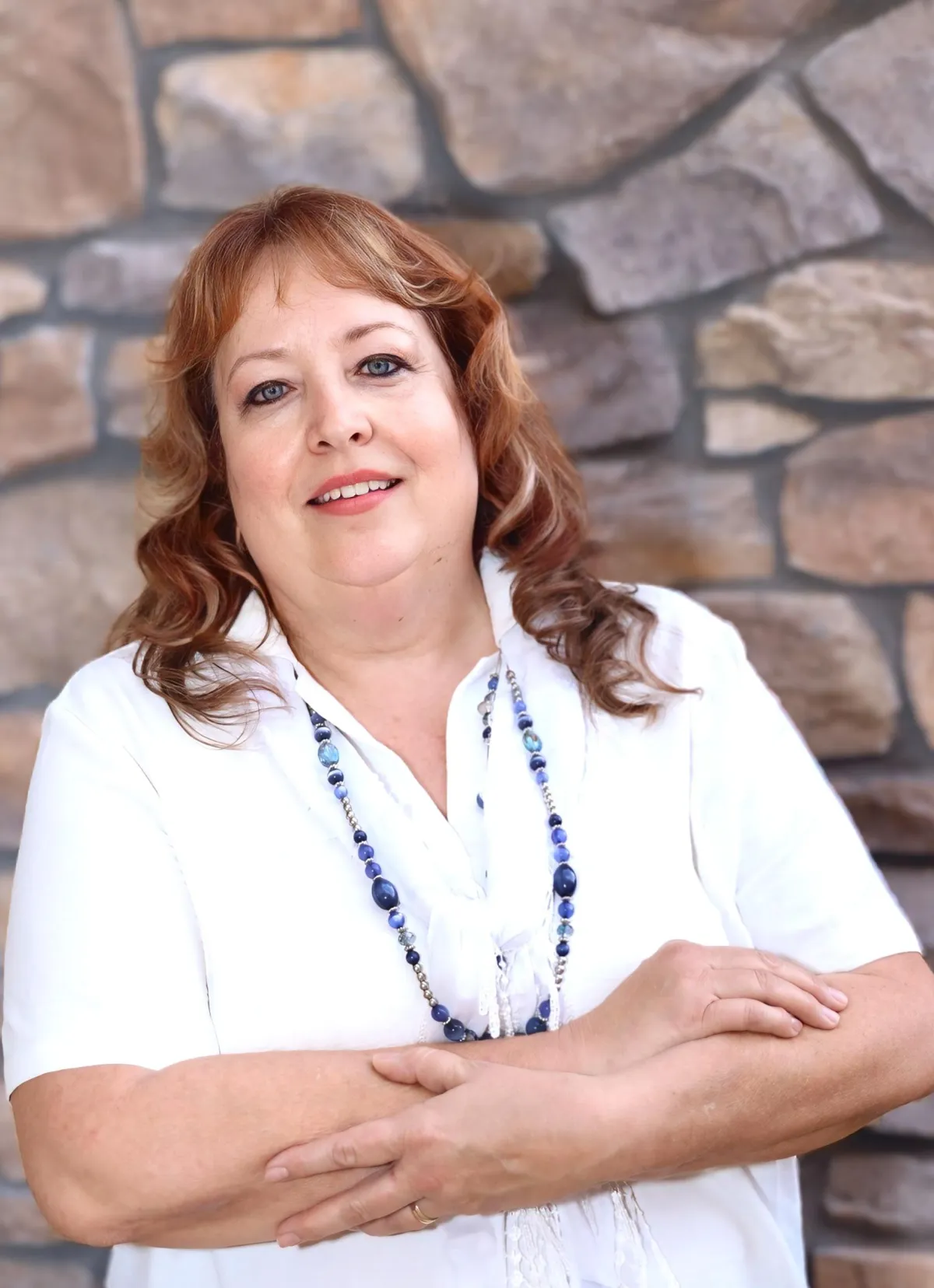 Blanca, Concierge Placement Agent, professional headshot smiling with dark hair, wearing a light blouse.