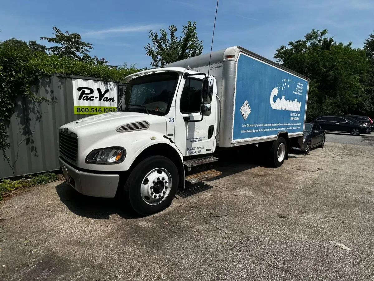 Electrician working with electrical panel and components