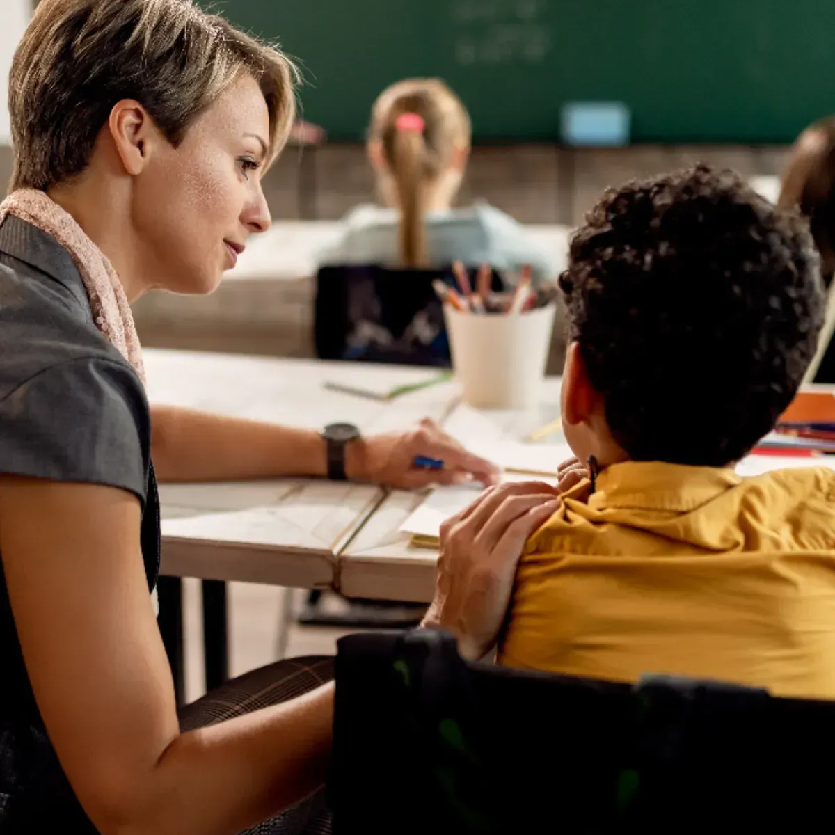 Parent and child working with a disability advocate in Colorado Springs