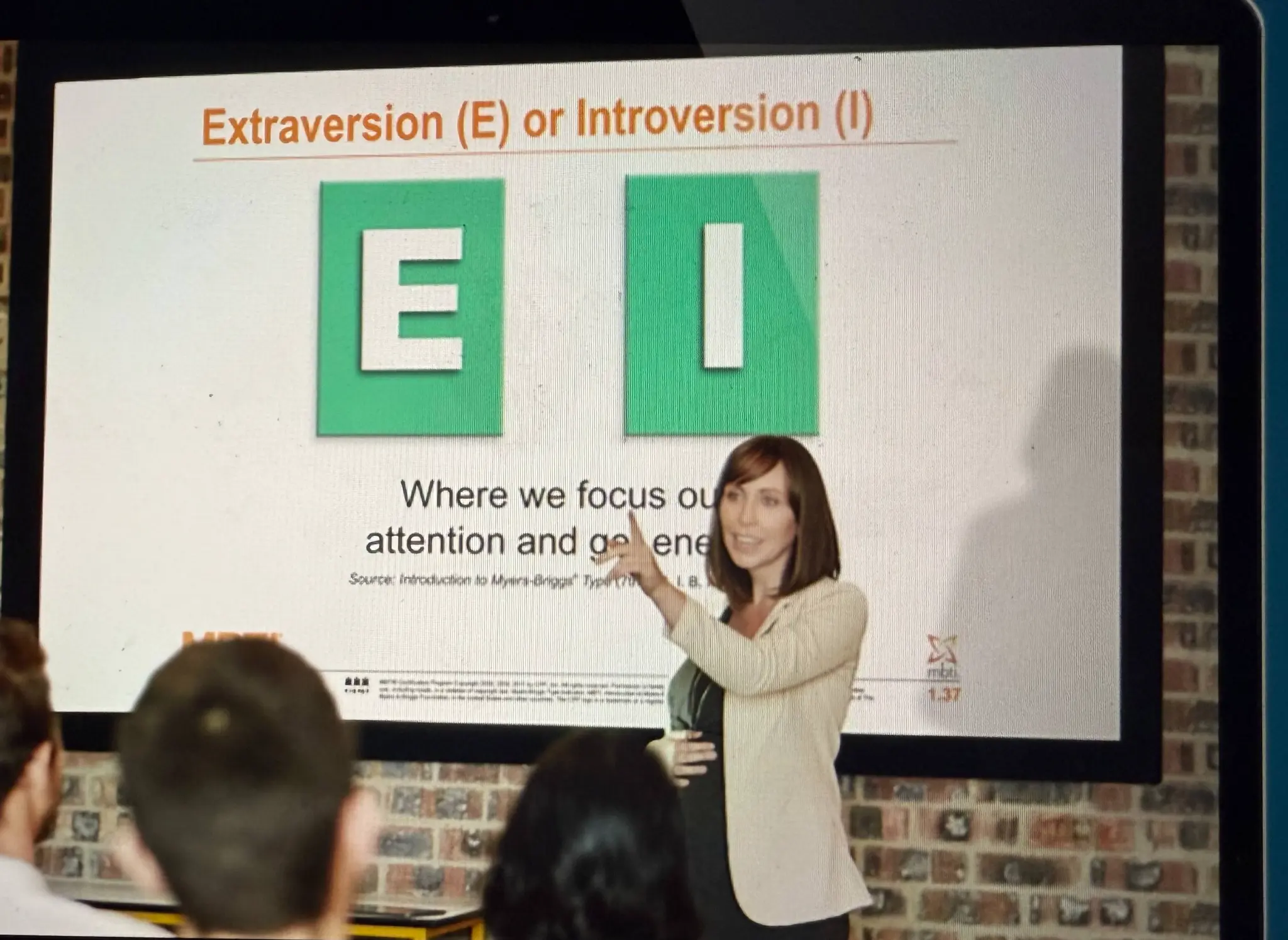 ALC People Solutions MBTI workshop showing Kathy teaching Extraversion and Introversion
