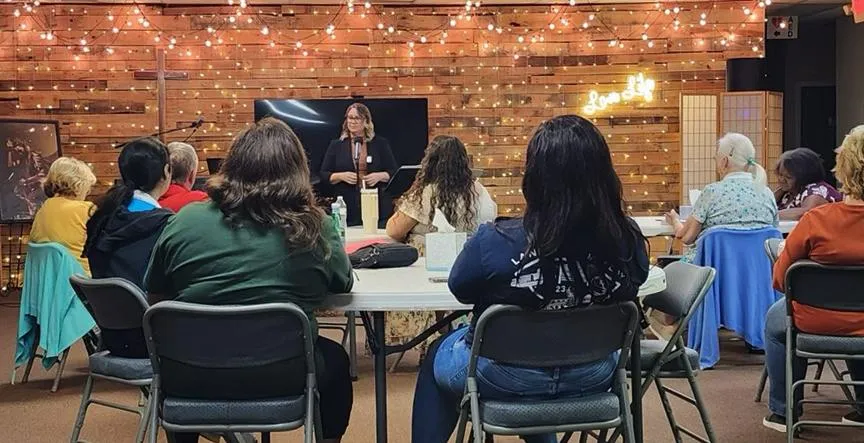 Teia speaking to an audience