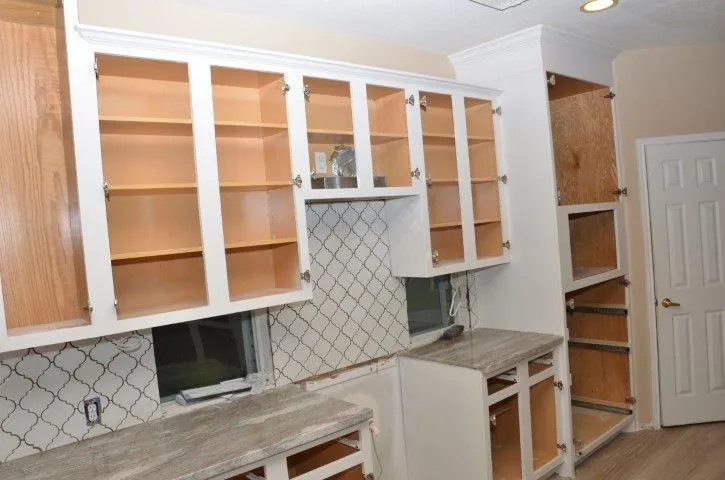 Wethersfield Carpentry Masters in Wethersfield CT custom white kitchen cabinets installed on a wall.