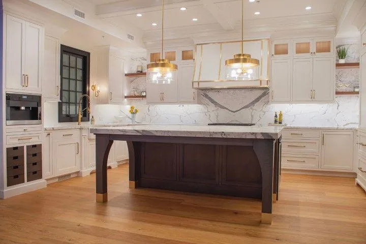 New Milford Carpentry Crafts in New Milford CT luxury white kitchen with a large dark island.