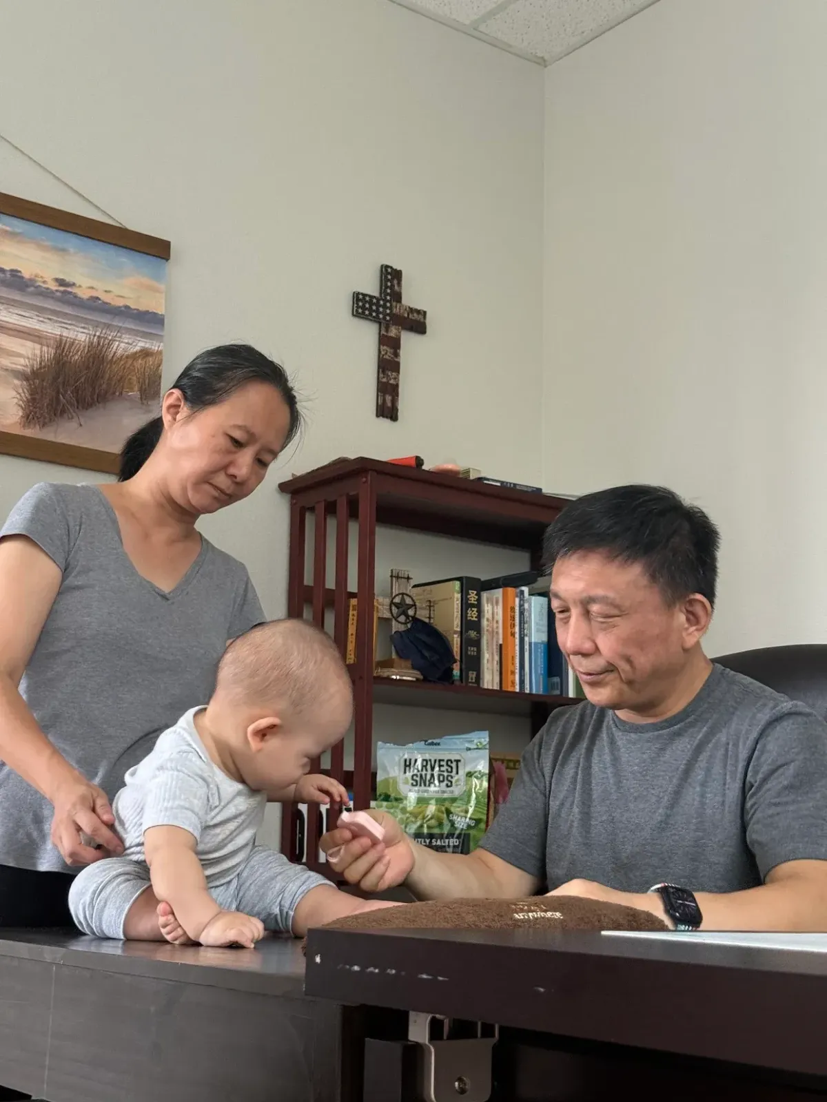 TCM practitioner's hands providing pregnancy-safe prenatal massage for lower back pain — Shou Ren Zhai, Katy TX