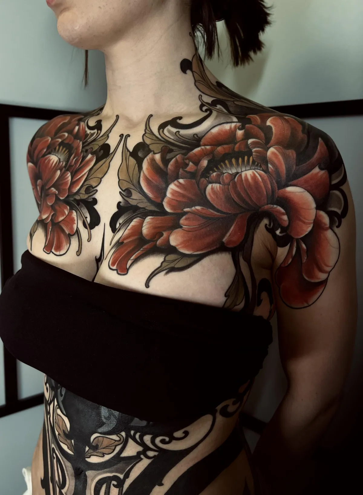 person with tattoo on right arm