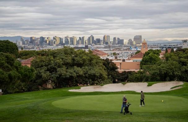 Scenic fairway view at The Loma Club with parents and spectators enjoying sunny San Diego weather