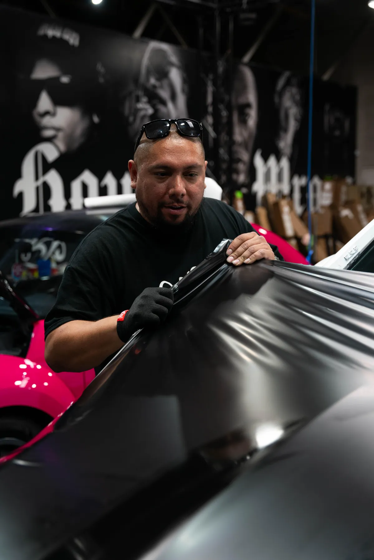 Students learning vinyl wrap business strategies in a training workshop