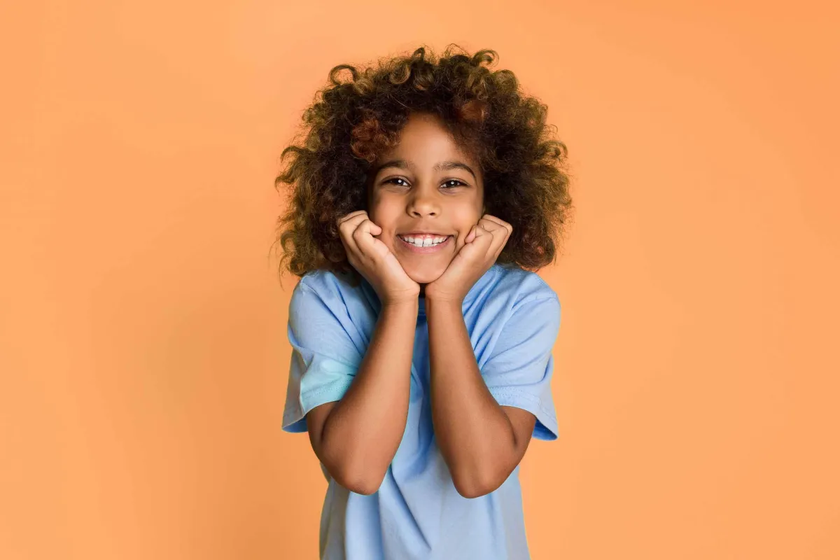Smiling child at Happy Kiddos Behavioral Services