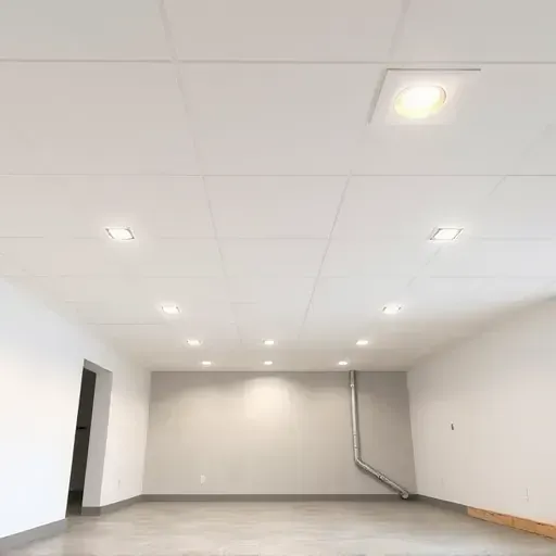 Newly installed basement ceiling in Columbus Ohio with recessed LED lighting, drywall, metal framing, and modern finishing