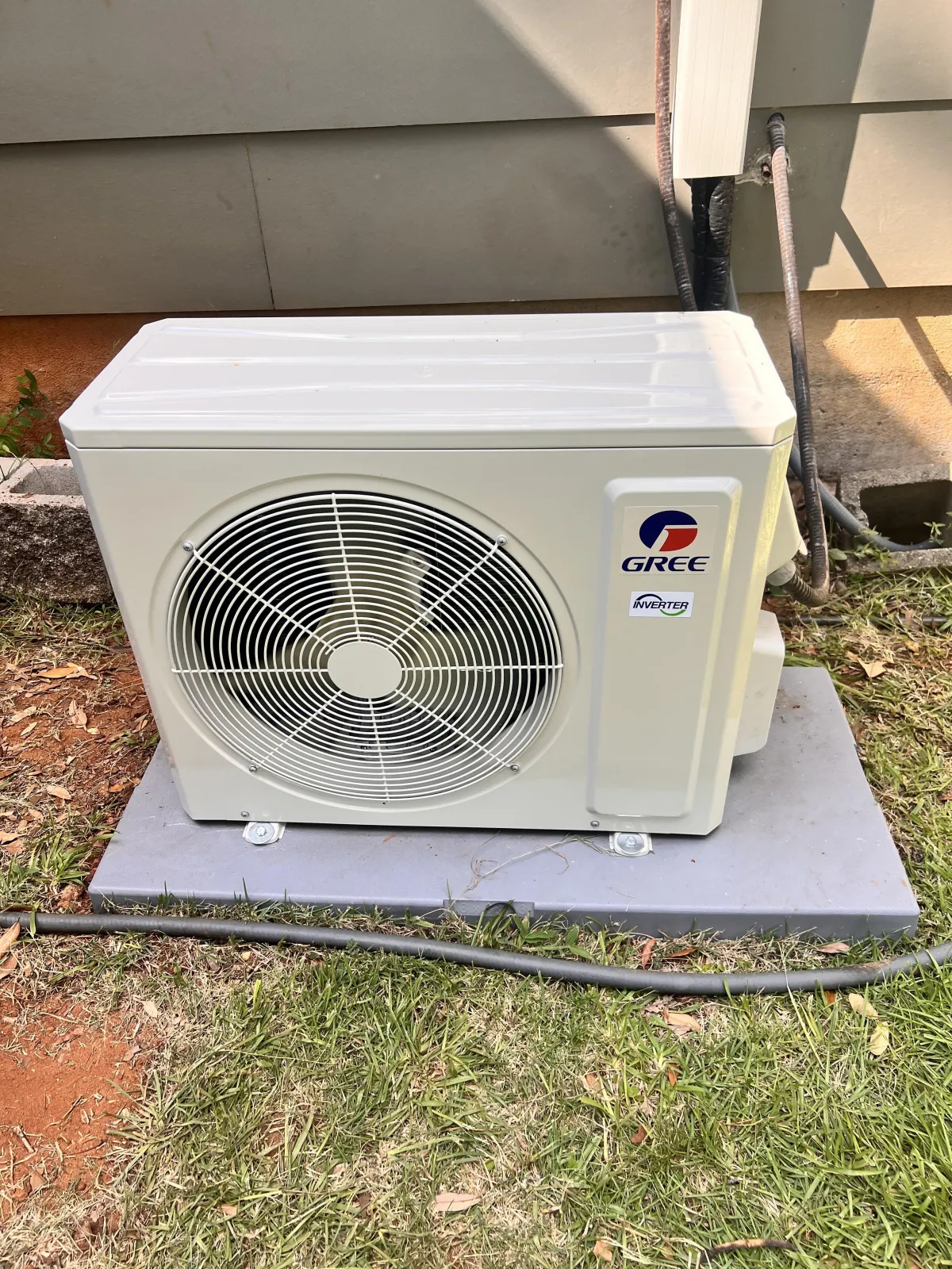 A modern building with many windows against the sky