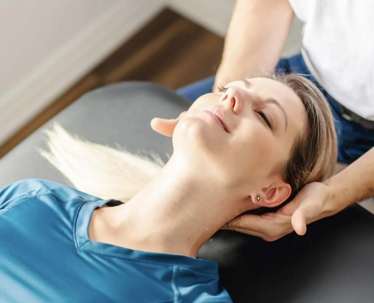 physical therapist helping with headache pain through therapy at 903 Physical Therapy in whitesboro, texas
