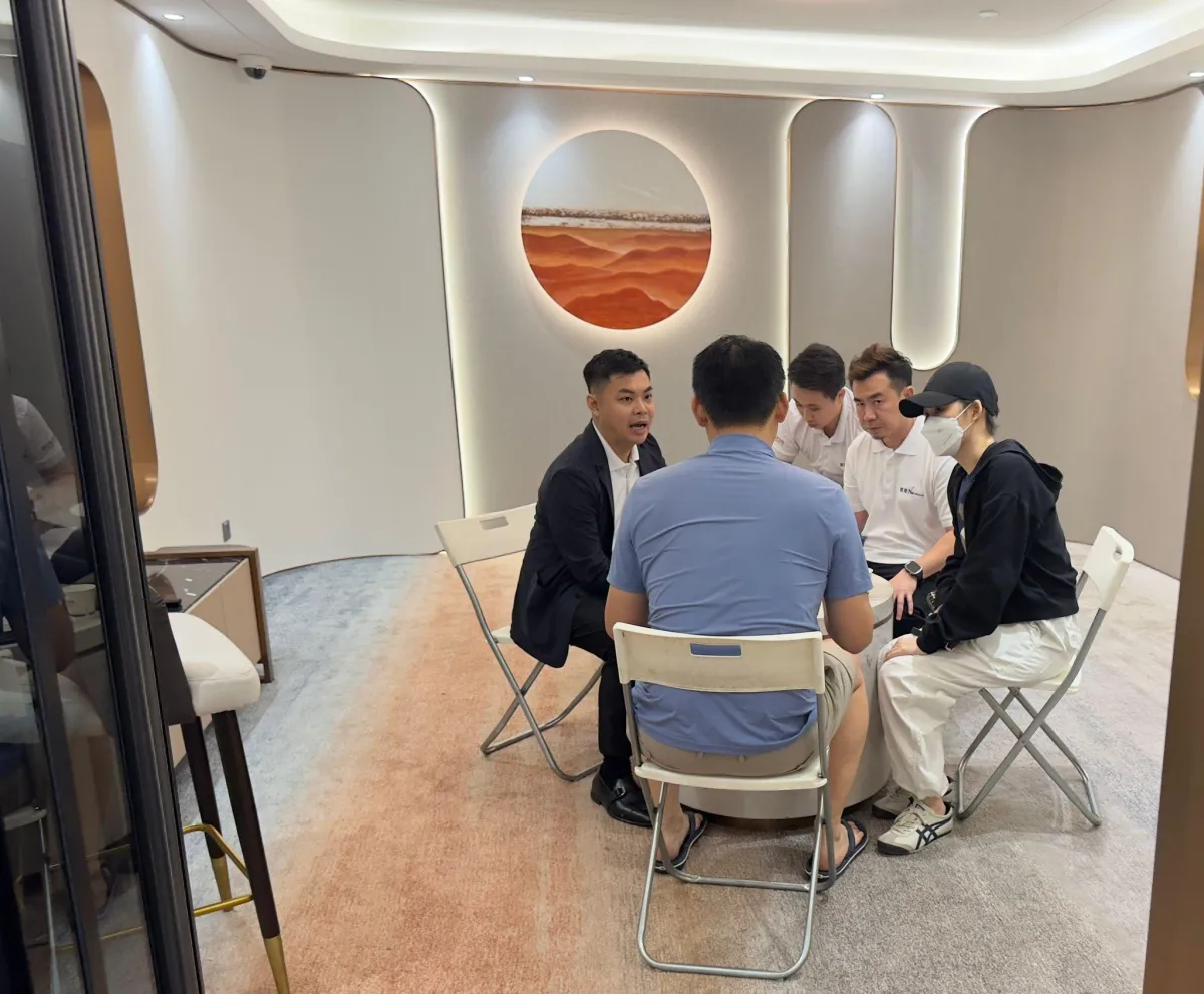 Benson Yip, LifePlanner Director, helping clients with funeral preplanning.