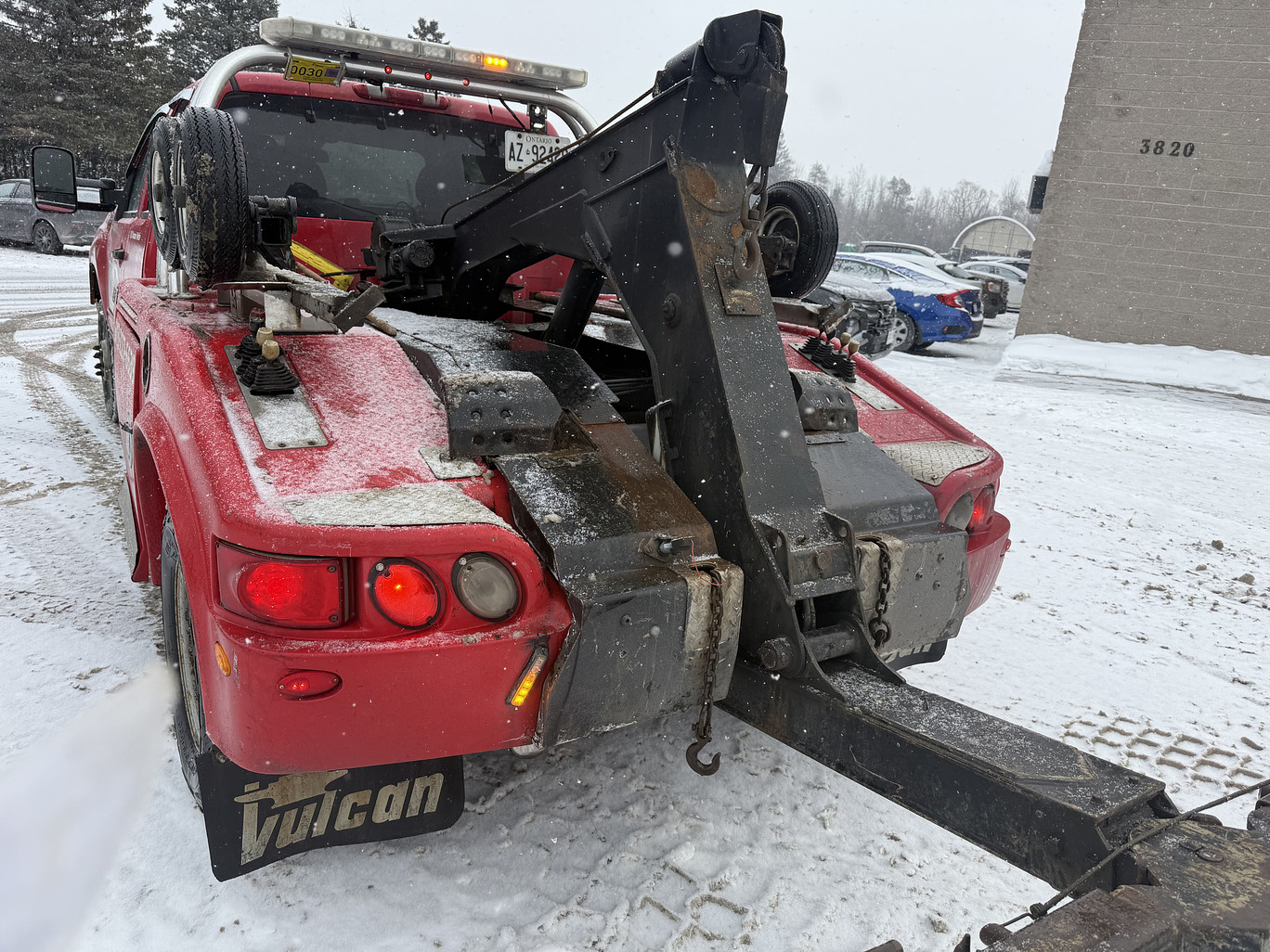 view photography of vehicle near electric post