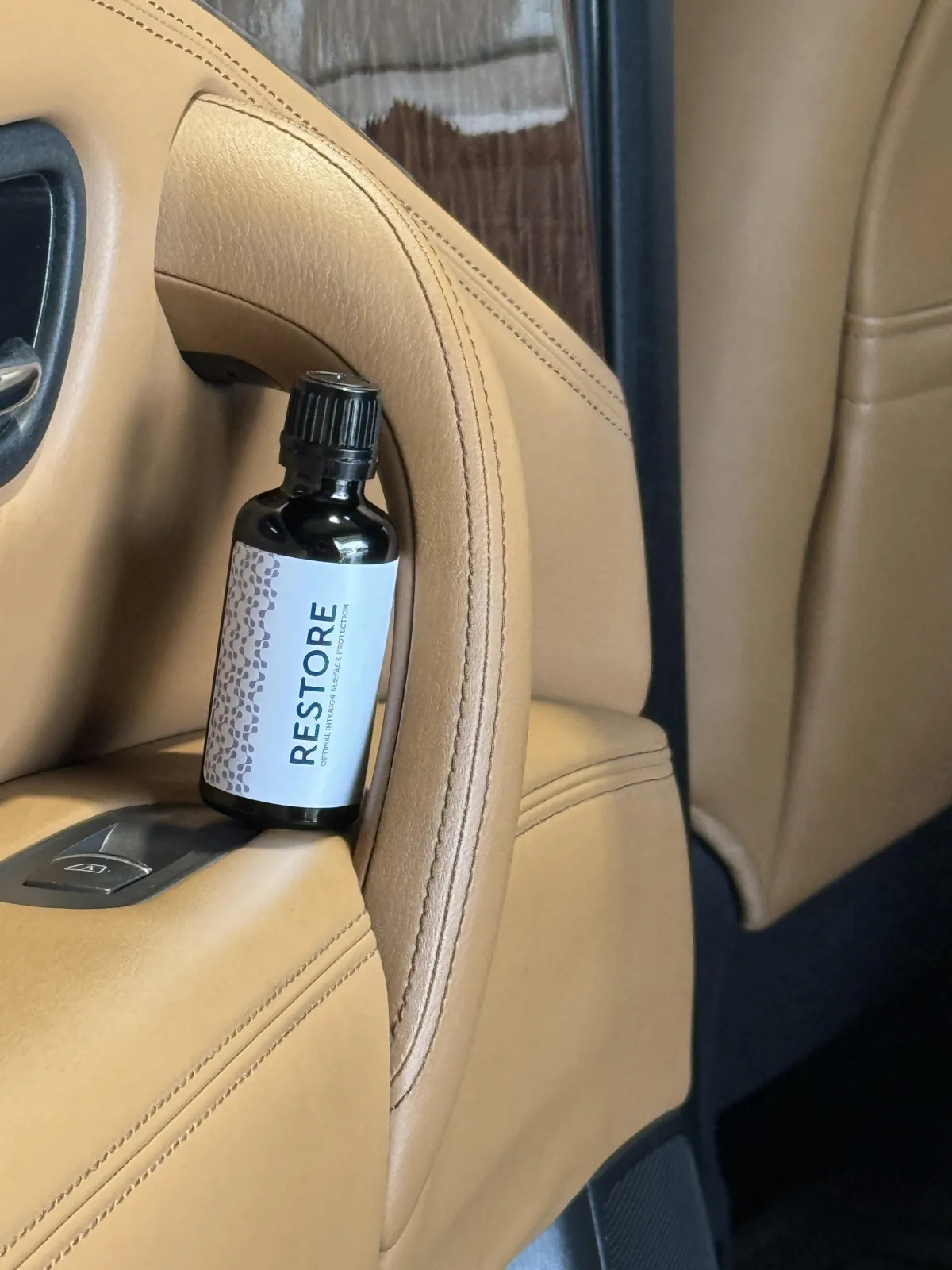 image of restore product sed on leather interior by HOOK Mobile Car Detailing and Ceramic Coatings