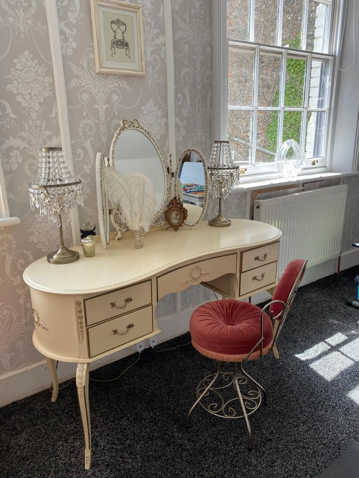 Dressing room with vintage dressing table and retro chair