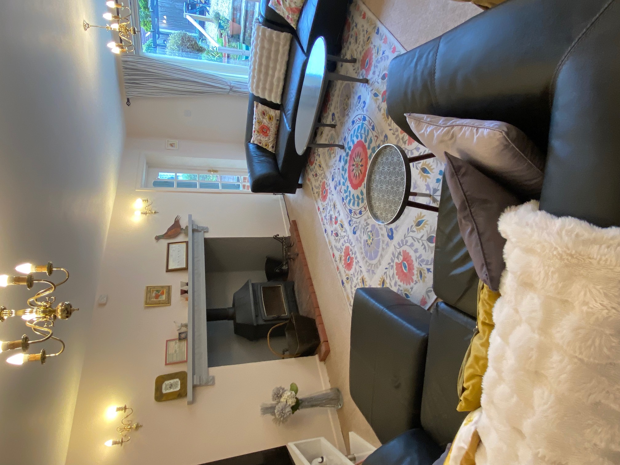 Soft furnishings soften the room adding colour and texture