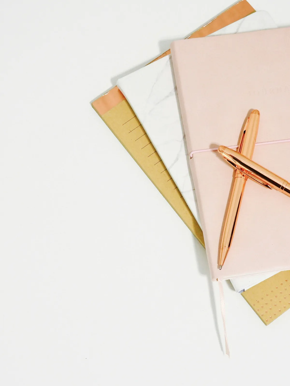 notebooks and pens
